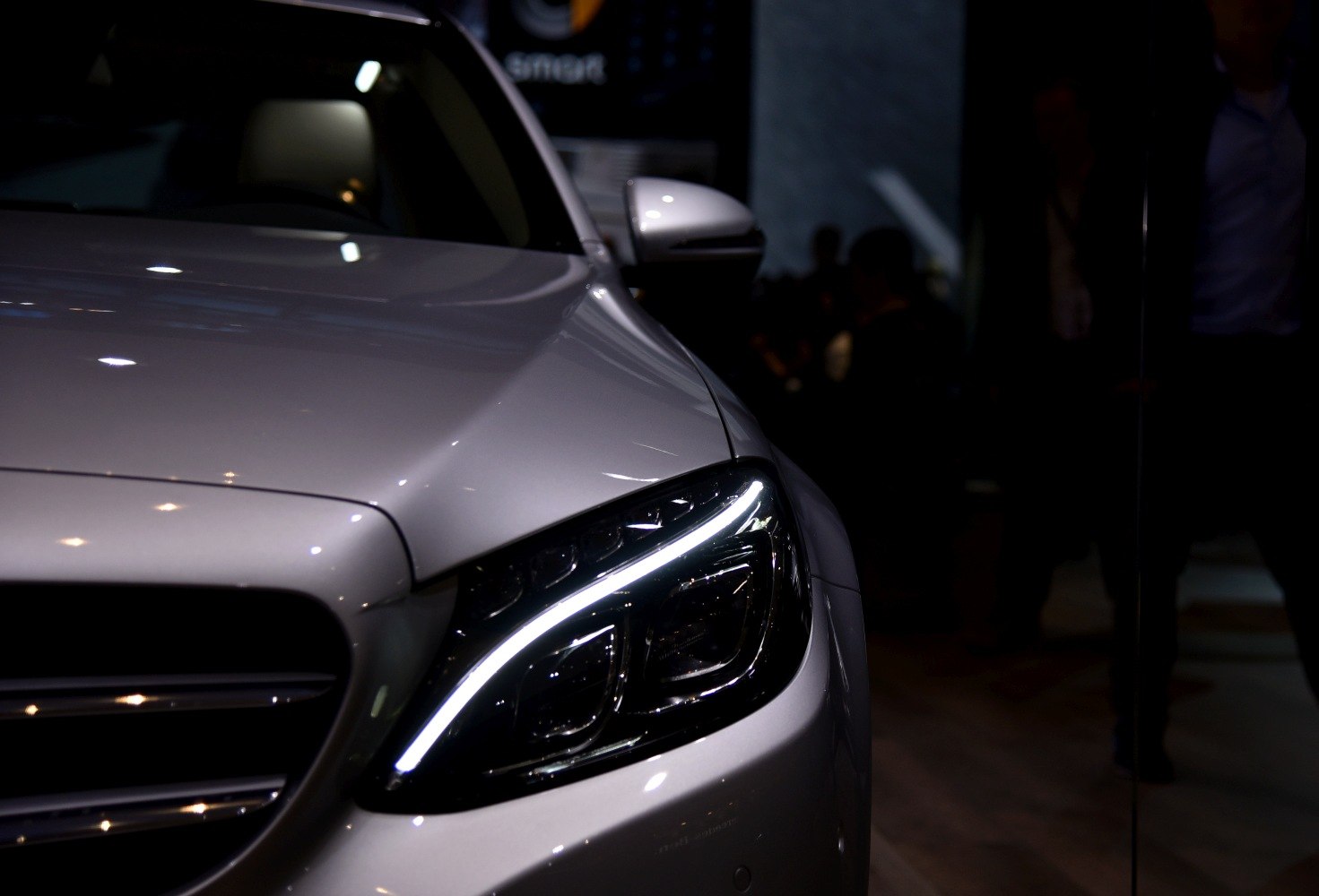 LED headlight with modern front grille