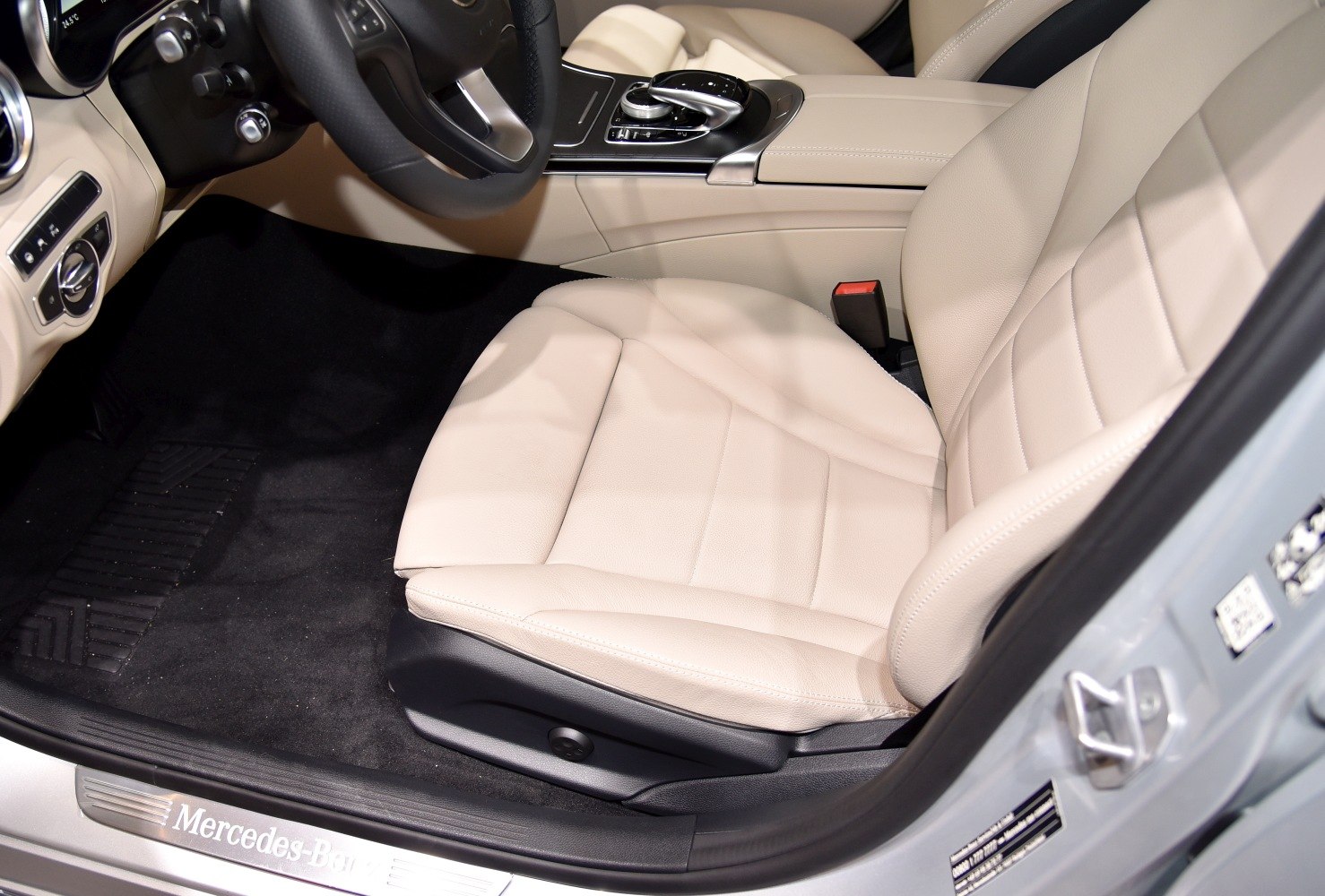 Beige leather driver seat and center console with gear selector