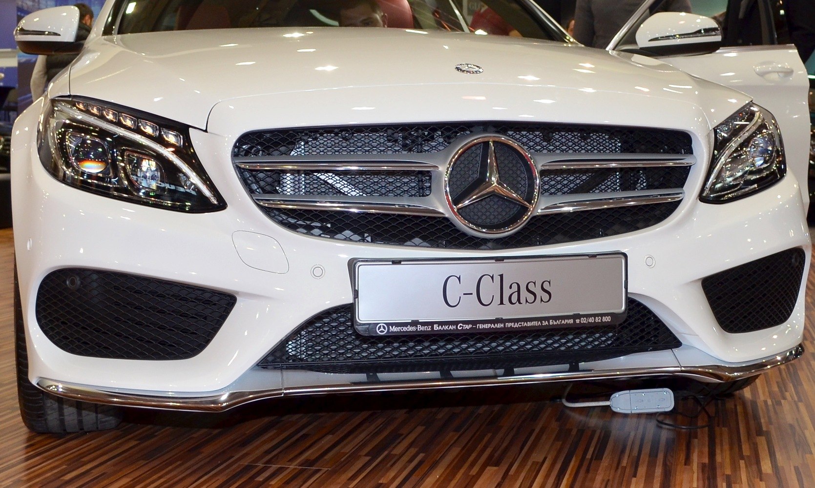 Front grille and LED headlights of a luxury sedan