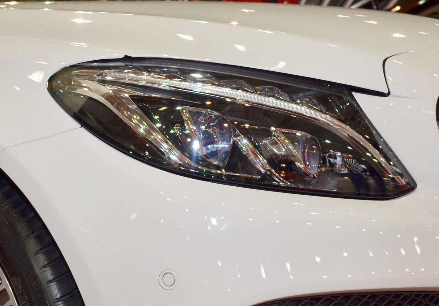 Stylish modern car headlight with LED elements and smooth curves