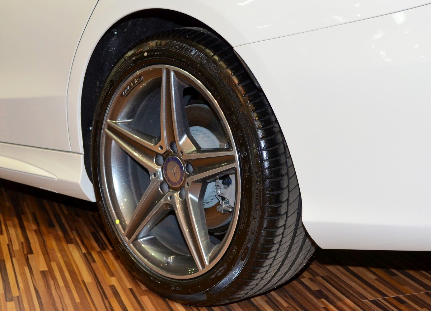 Close-up of alloy wheel and tire with brake disc