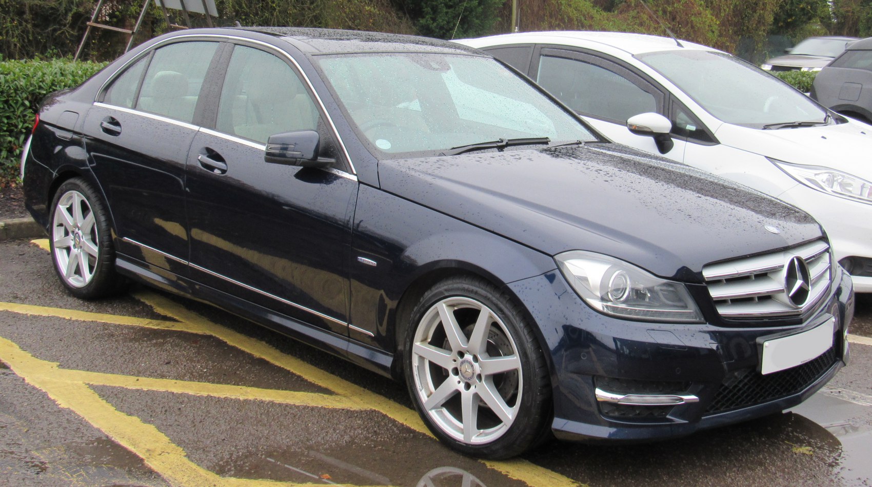 Sedan with sporty alloy wheels and chrome window trim