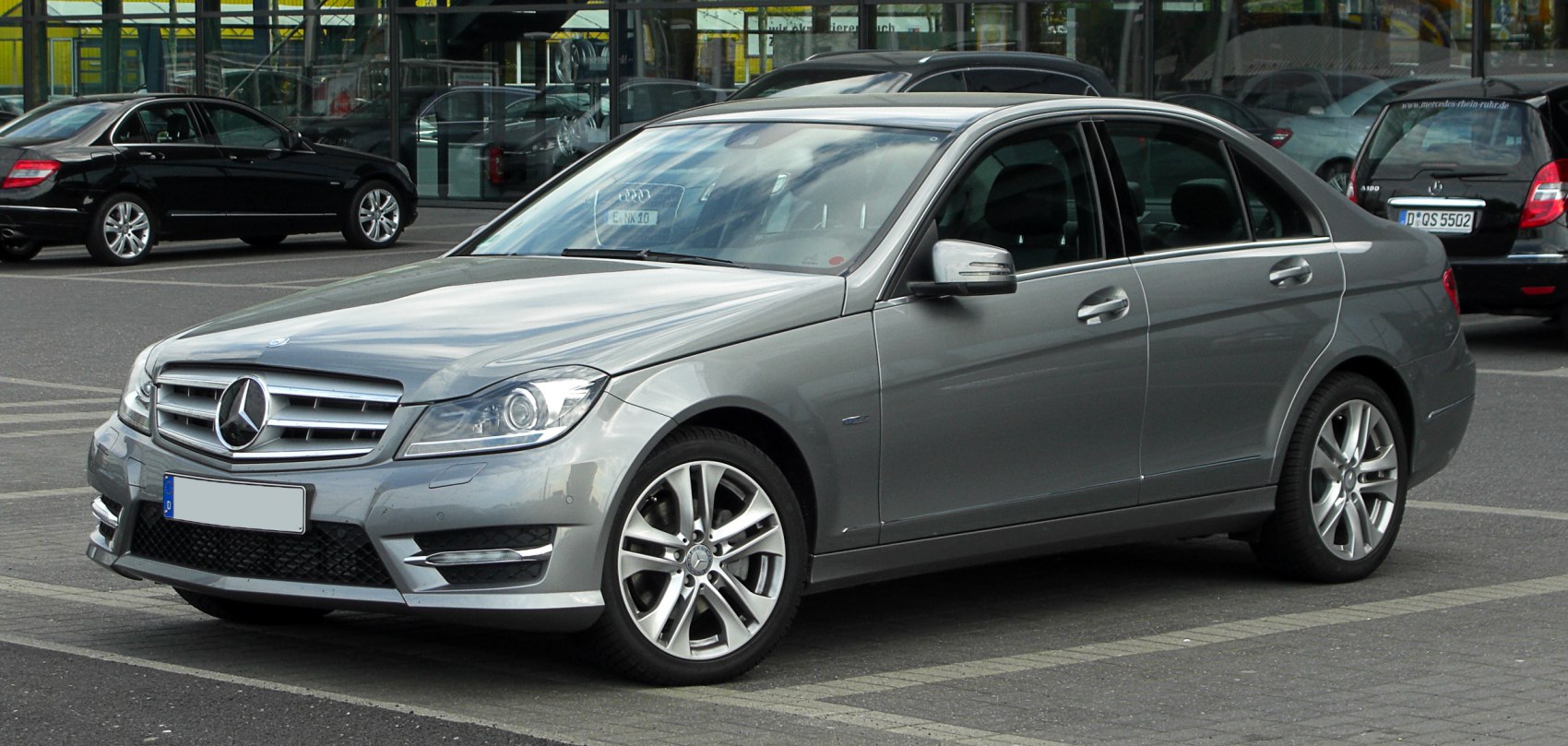 Front side view with headlamps and alloy wheels