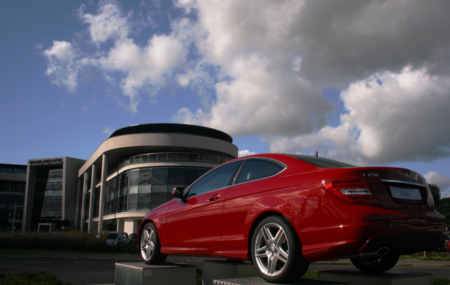 Red coupe with alloy wheels and LED tail lights