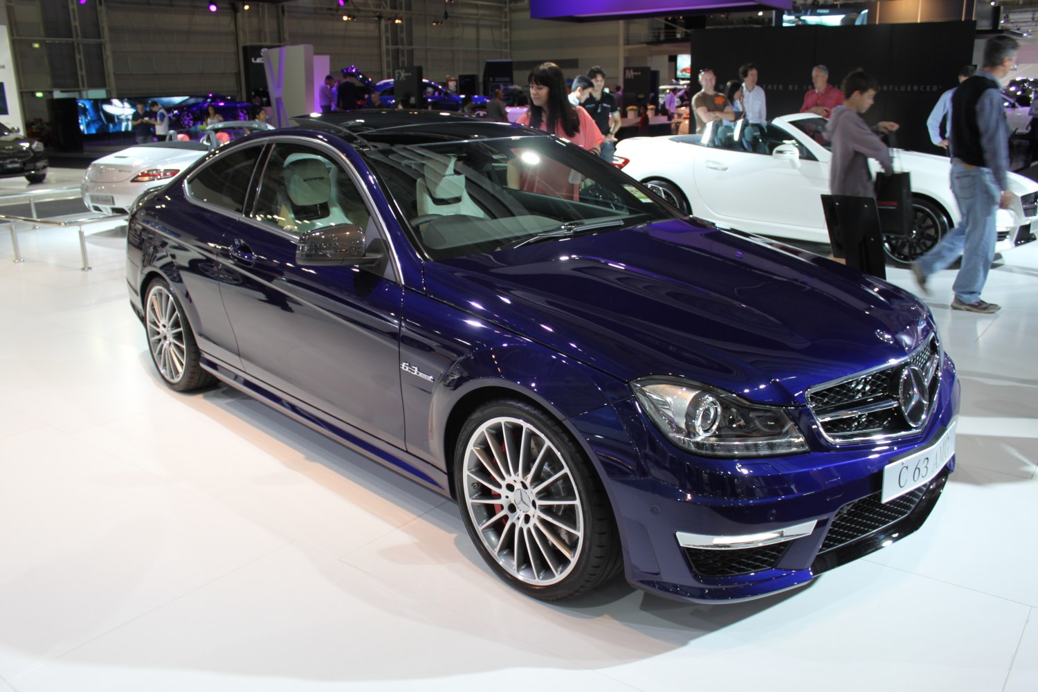 Sporty coupe with AMG 63 badge, alloy wheels, aggressive front grille