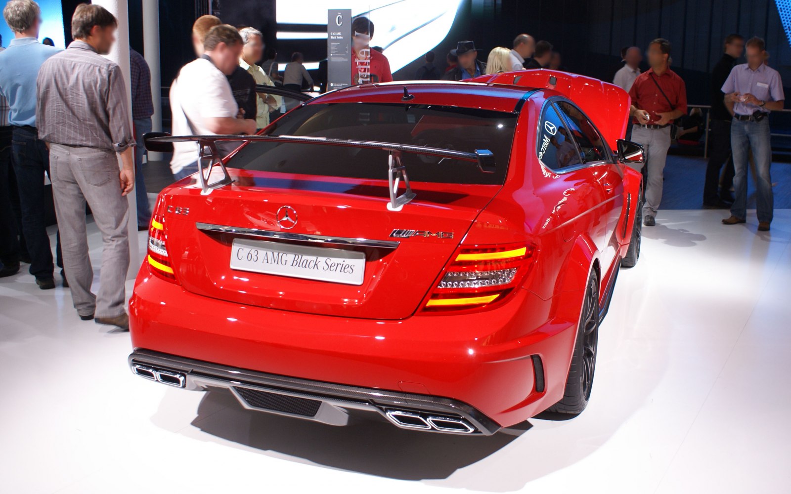 Rear view with large spoiler and quad exhaust