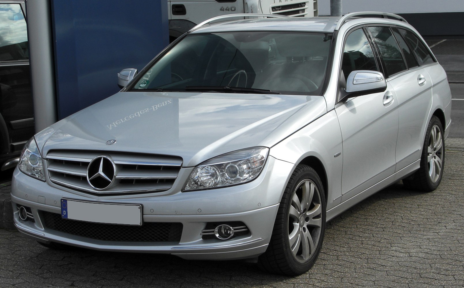 Front view of silver station wagon with signature grille and headlights