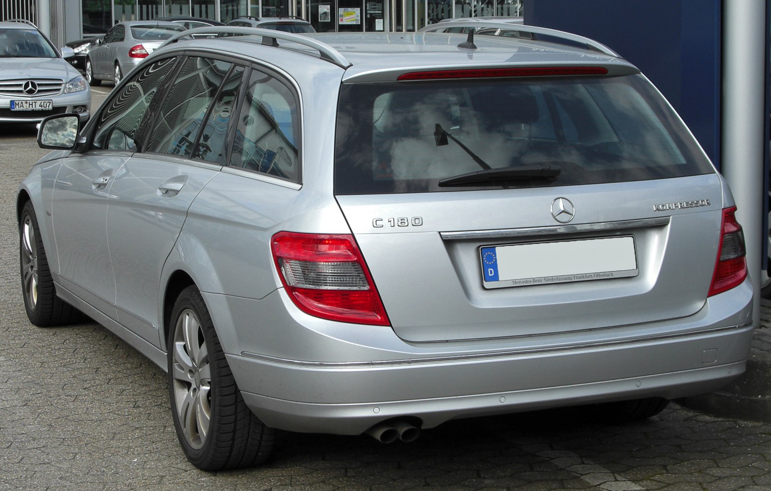 Estate rear view with dual exhaust and roof rails