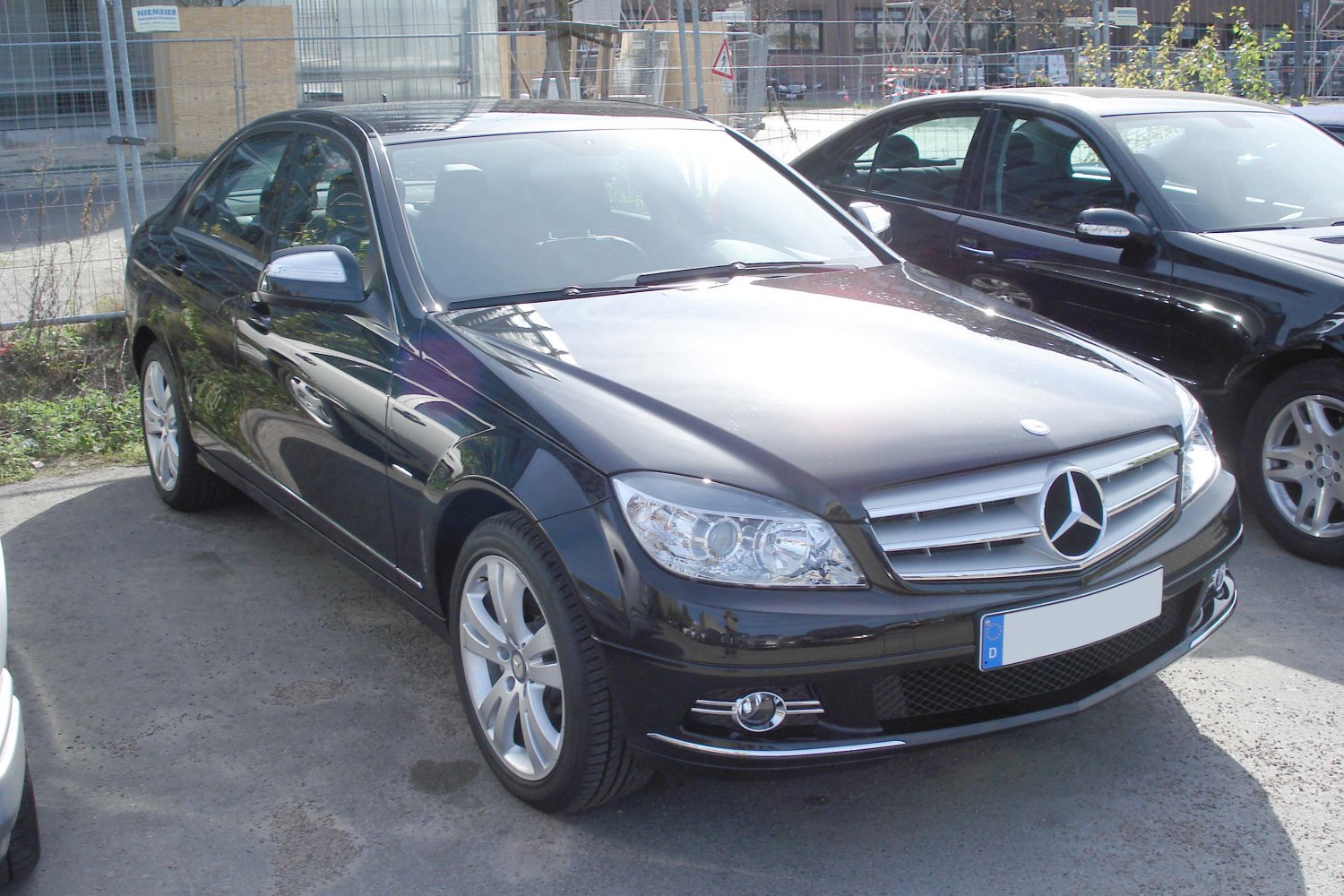 Front view showing headlights, grille, and alloy wheels