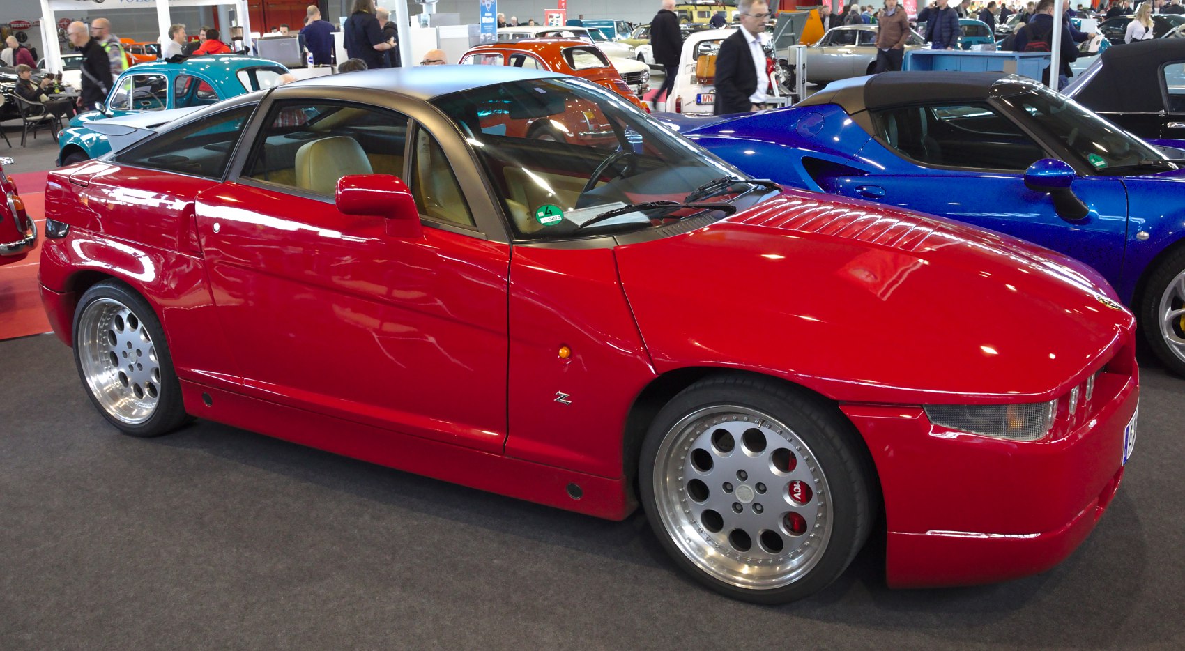 Angular body design and circular multi-hole alloy wheels