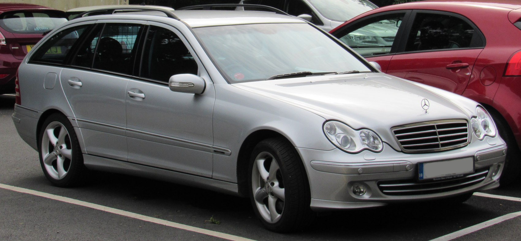 Silver station wagon with distinctive front headlights and grille