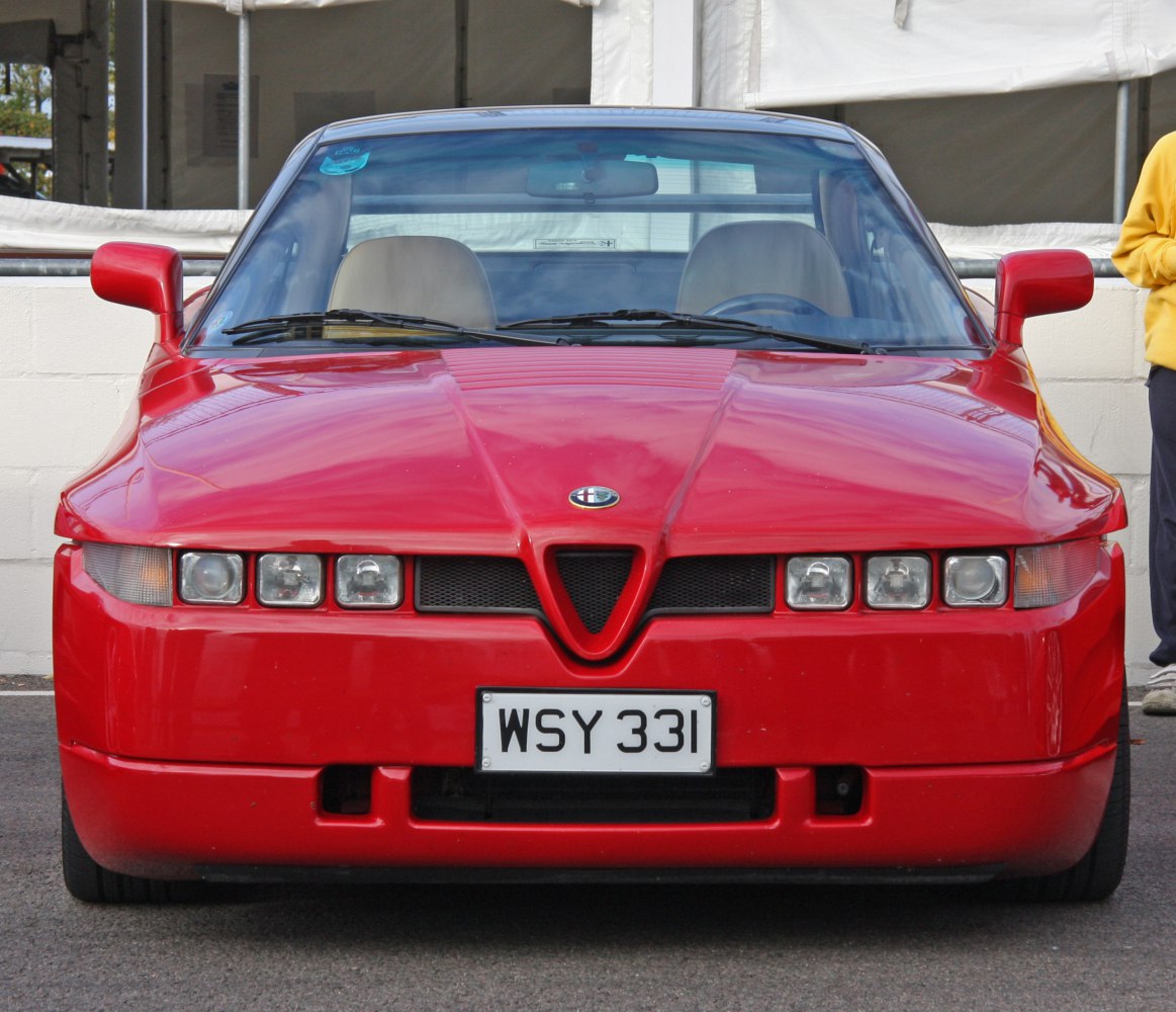 Front view with quad headlights and sharp hood lines