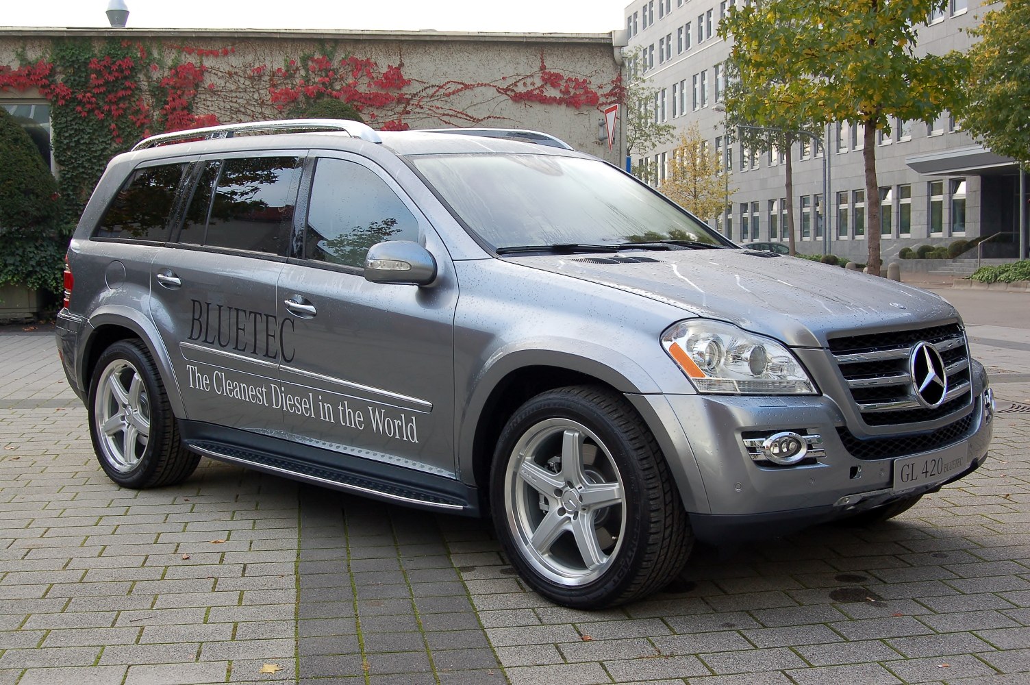 Front side view of silver SUV with Bluetec clean diesel decals