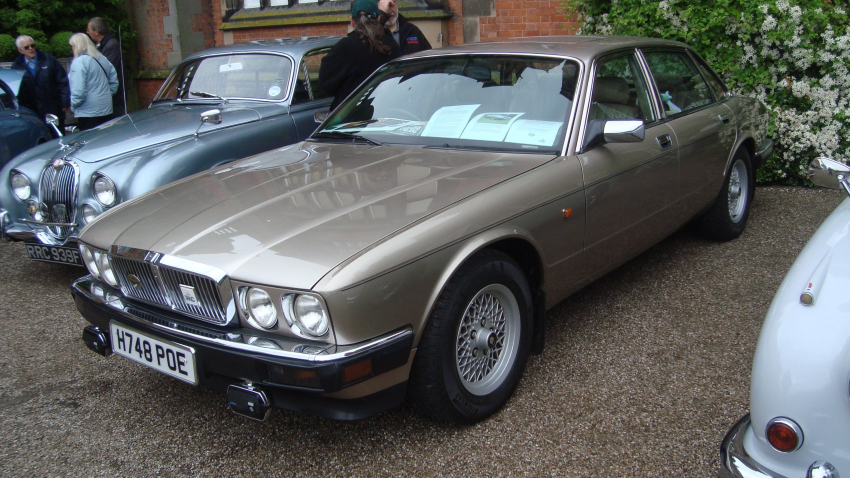 Front view with rectangular headlights and mesh alloy wheels