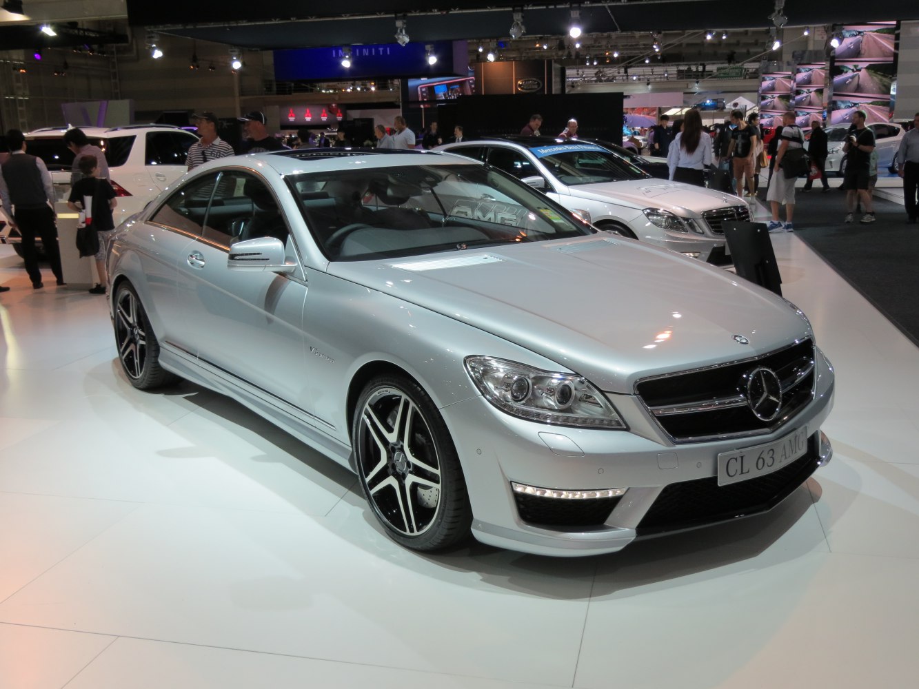 Front and side view of a silver luxury coupe with V8 Bi-Turbo badge and sporty wheels