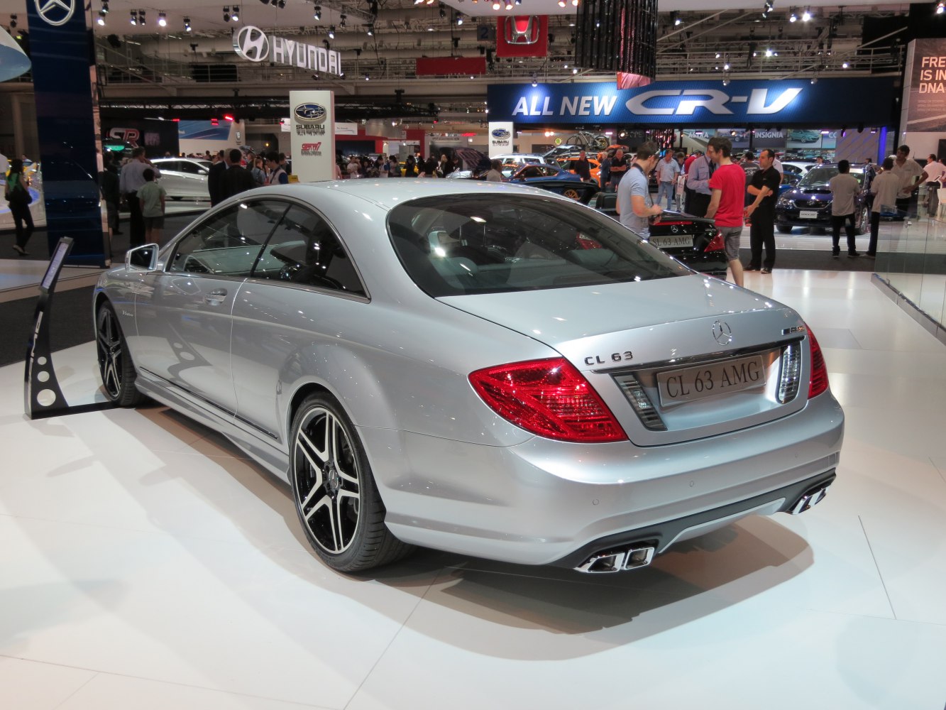 Sporty rear view with quad exhausts and taillights