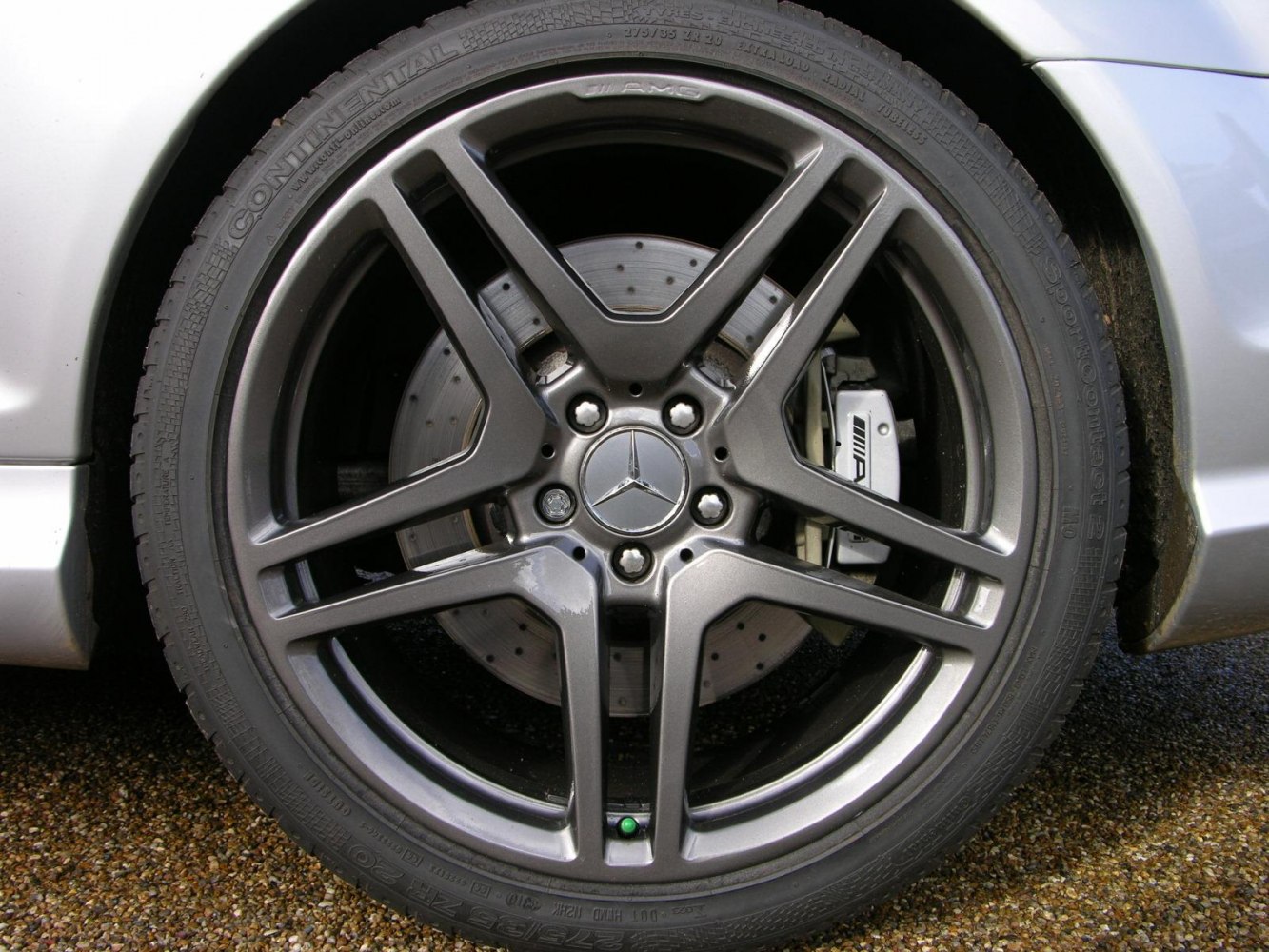 AMG alloy wheel with drilled brake disc and brake caliper