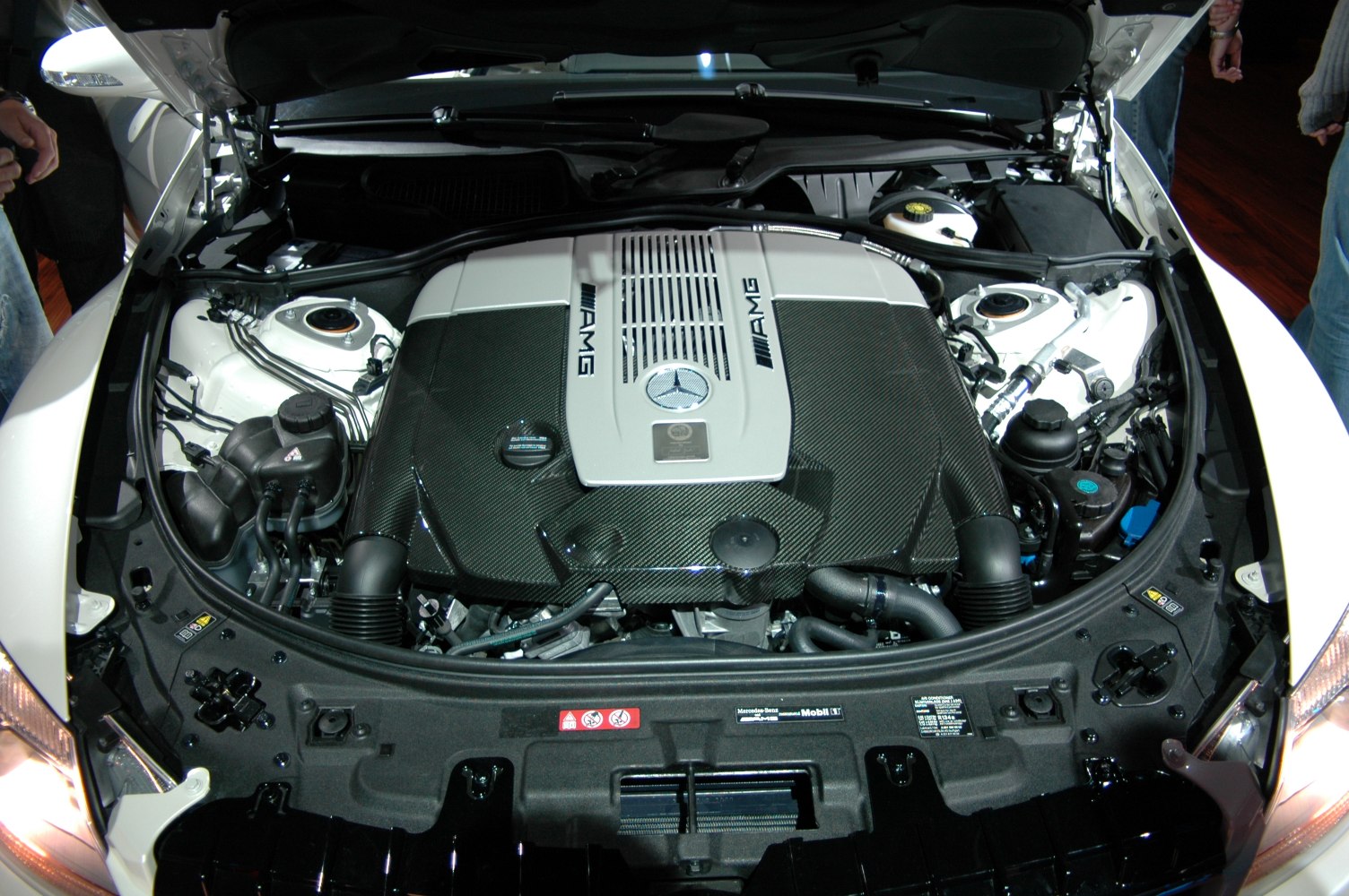 Close-up of AMG V8 engine with carbon fiber cover