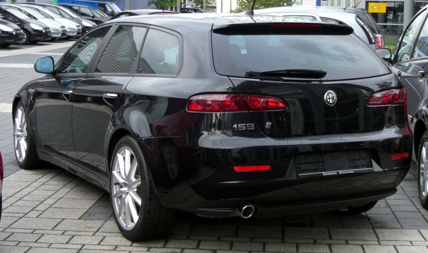 Rear view of a sleek hatchback wagon with distinctive taillights.