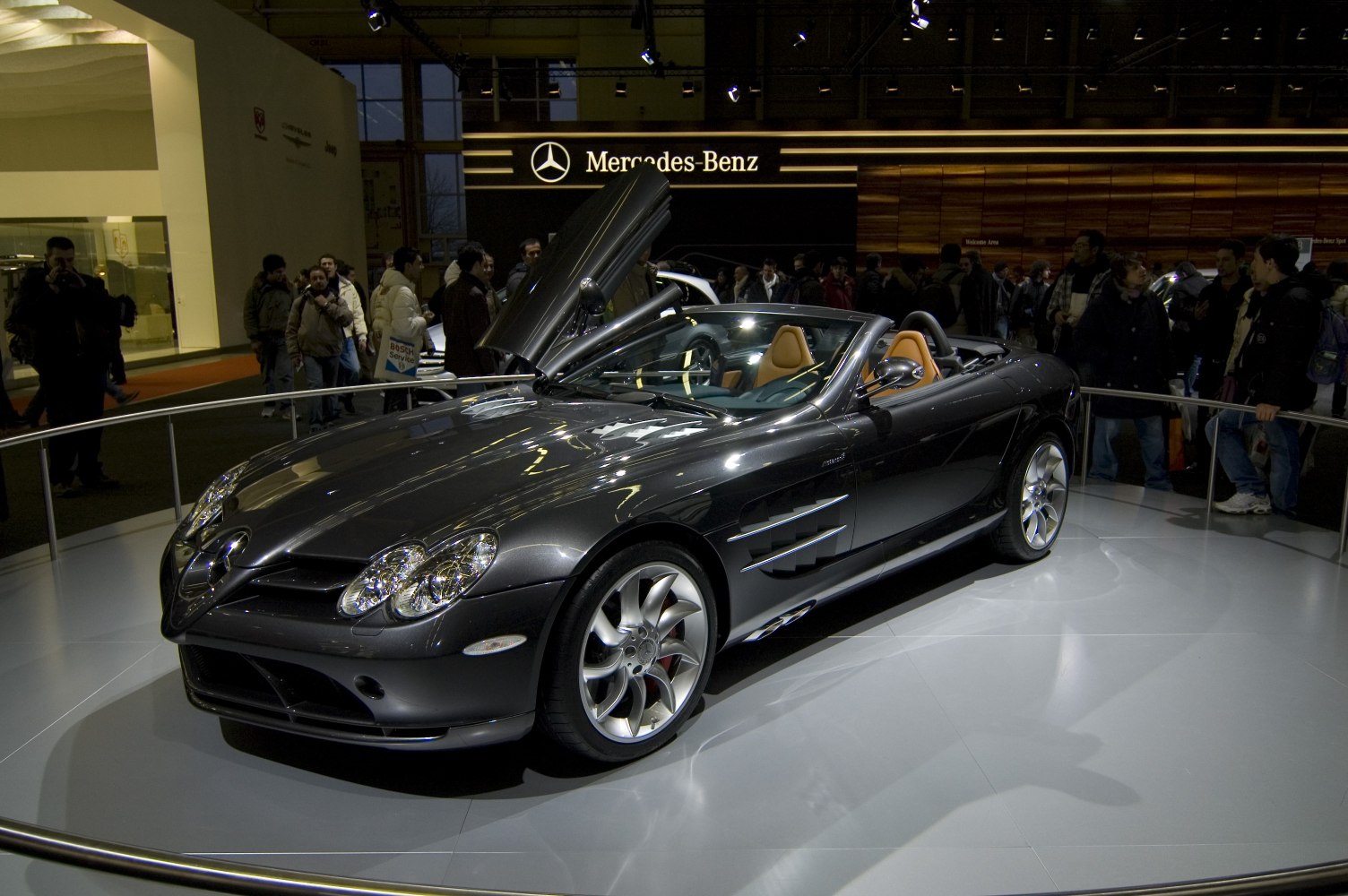 Luxury convertible with butterfly doors and alloy wheels