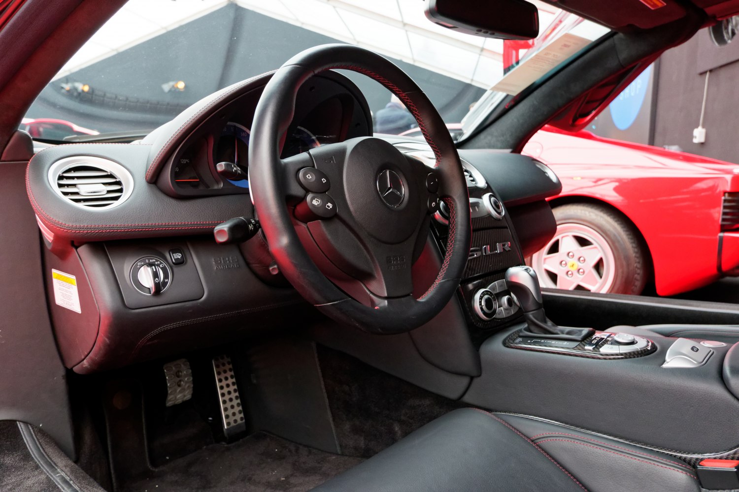 Leather steering wheel and center console with gear shifter and dashboard controls