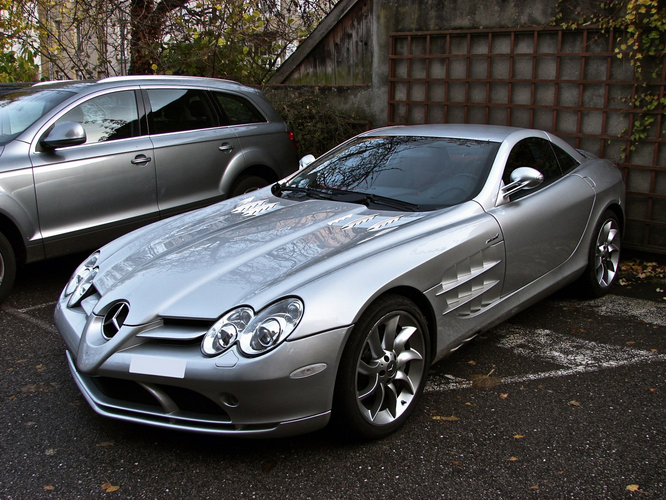Silver coupe with distinctive front and side vents in aerodynamic design