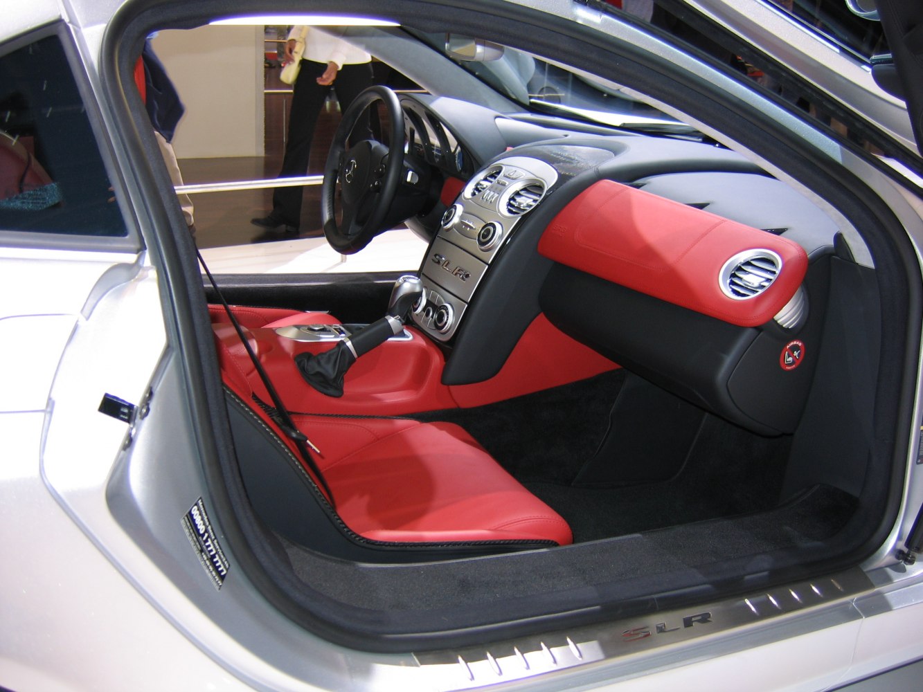 Red leather interior and dashboard of a luxury sports coupe