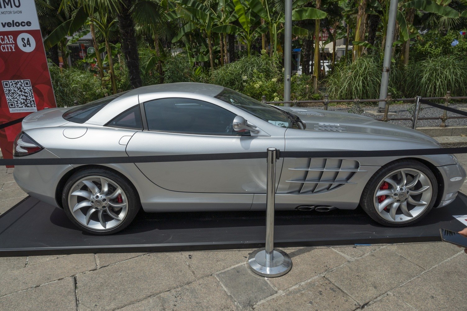 Silver coupe with side vents and distinctive alloy wheels