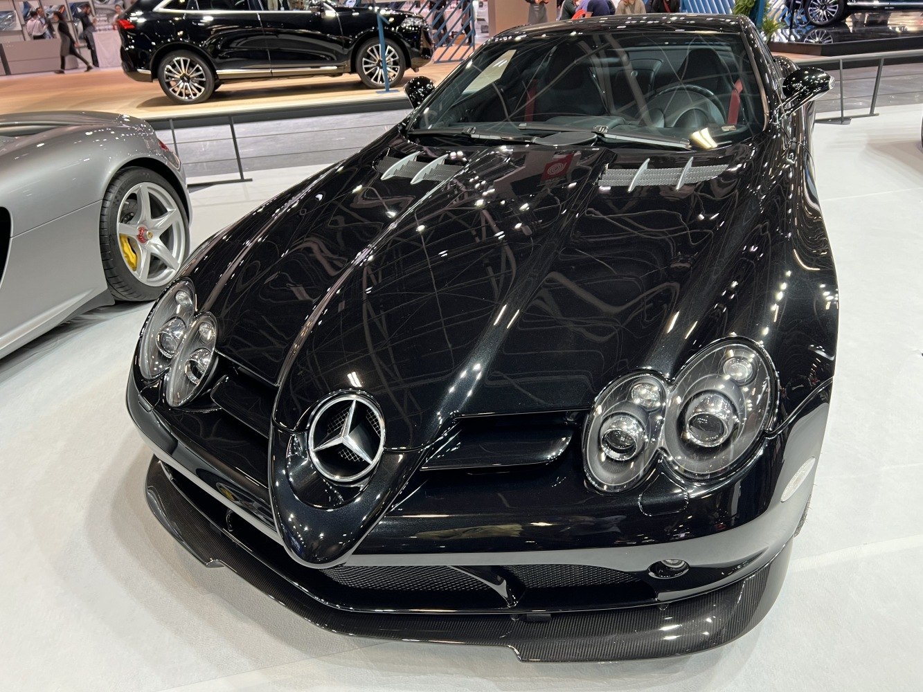Sport coupe front fascia with quad headlights and aerodynamic vents