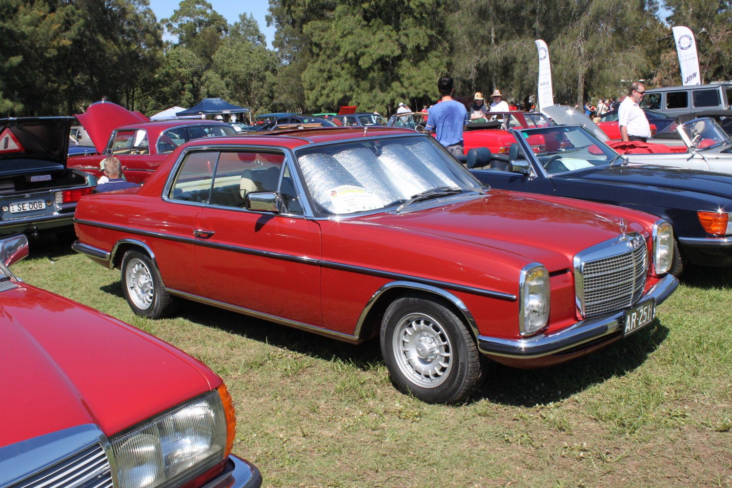 Vintage coupe with iconic front grille and classic wheel design