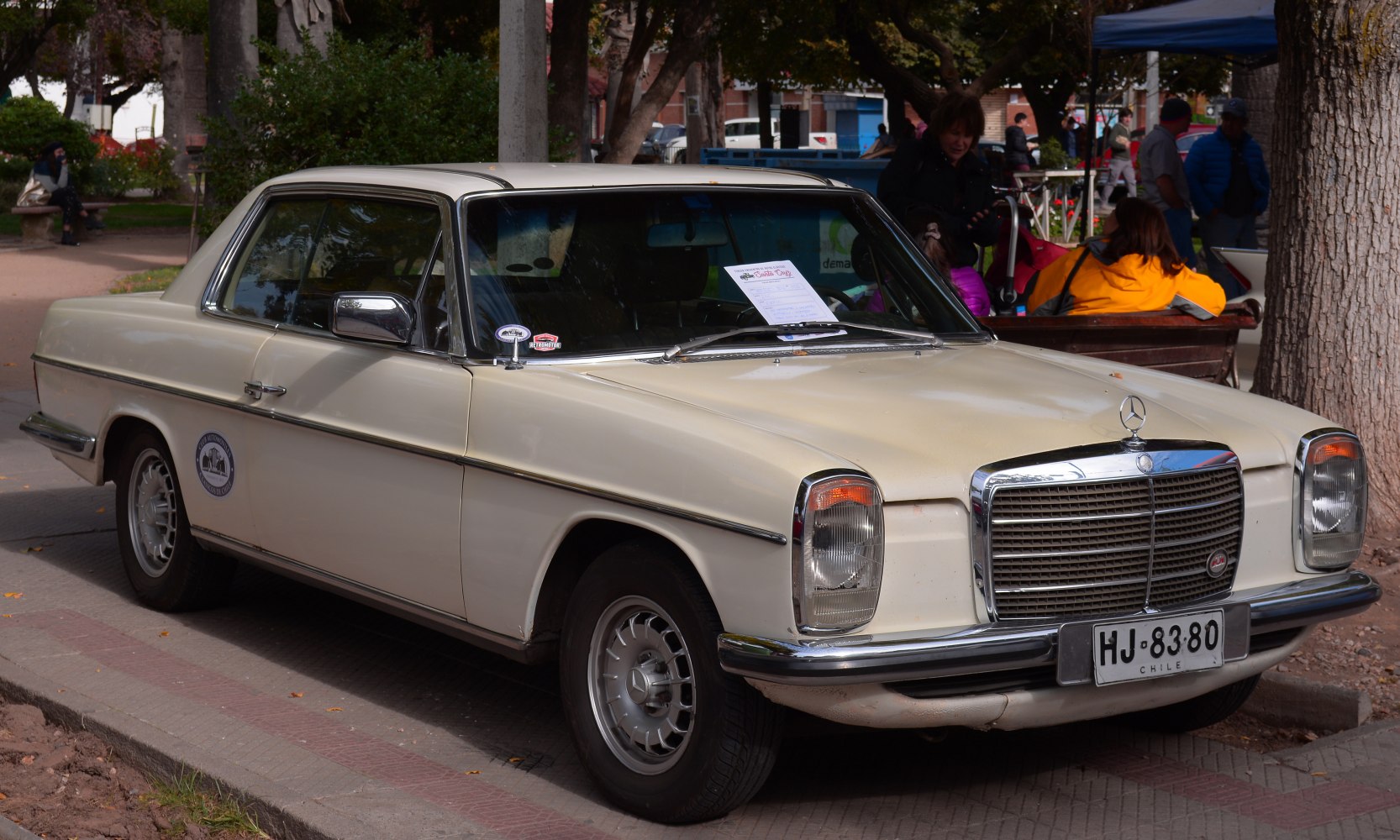 Vintage coupe with classic facelifted front grille and rectangular headlights