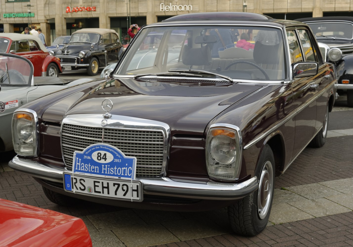 Vintage classic sedan front with prominent grille and headlights