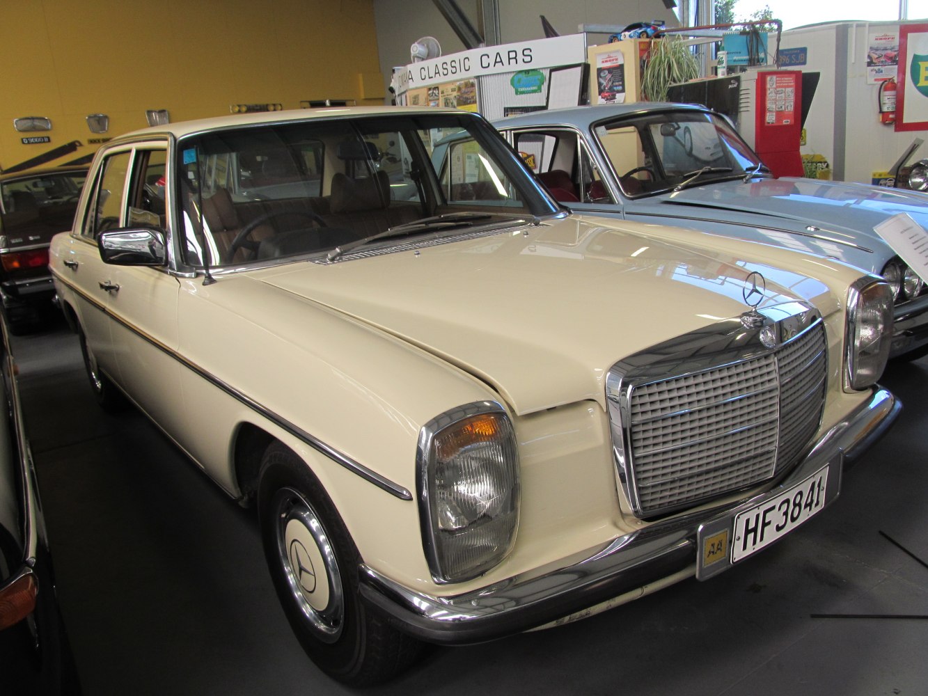 Classic luxury sedan with chrome grille and vintage headlights