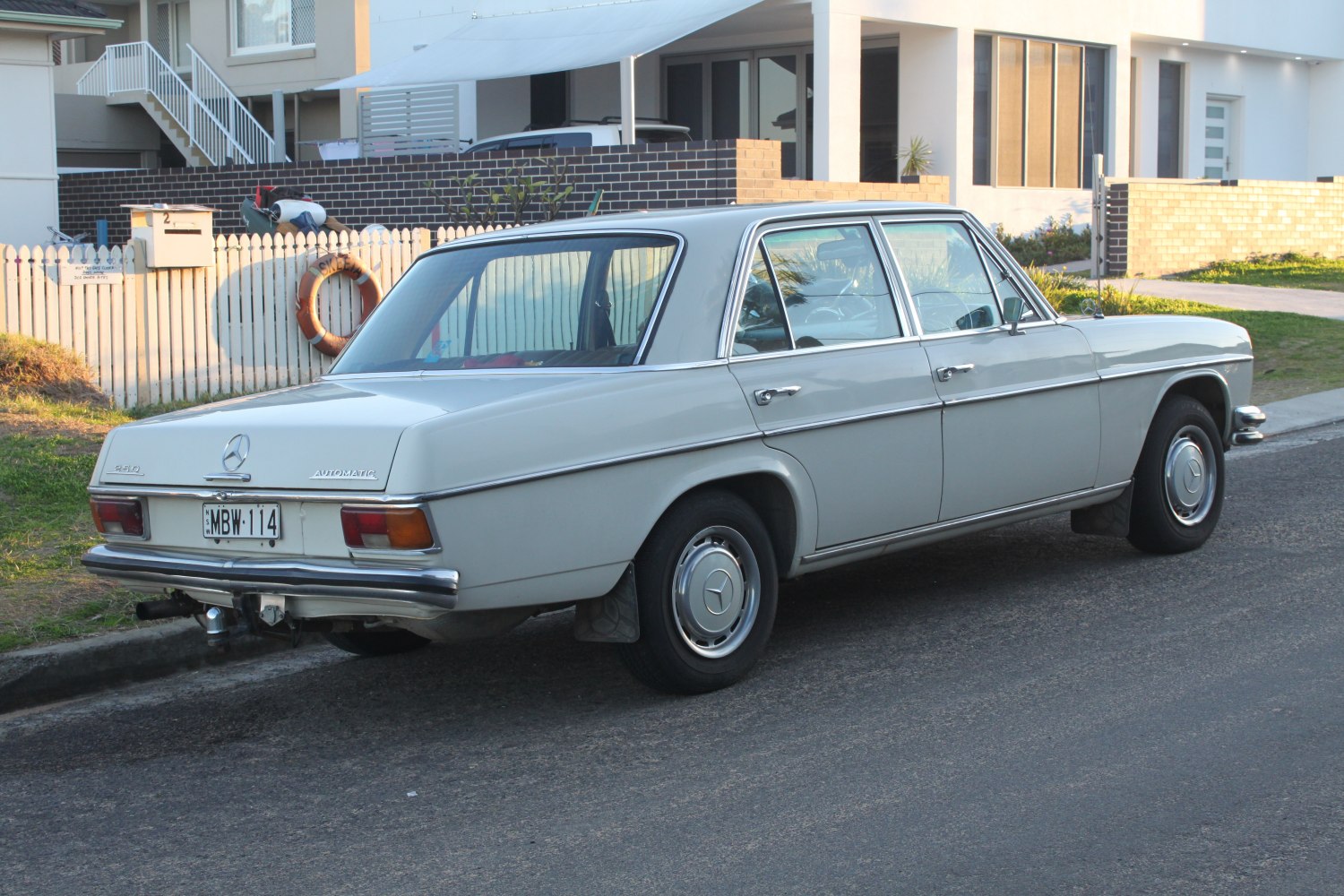 Classic vintage sedan rear and side profile with automatic transmission badge.