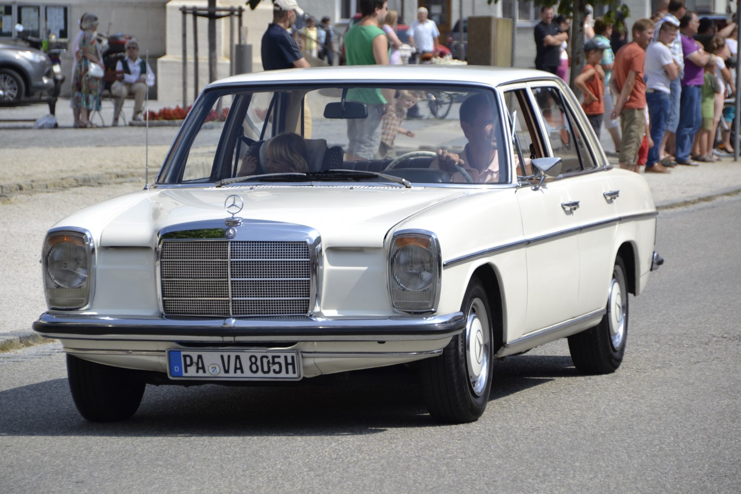 Front view of classic vintage luxury sedan with iconic grille and headlights