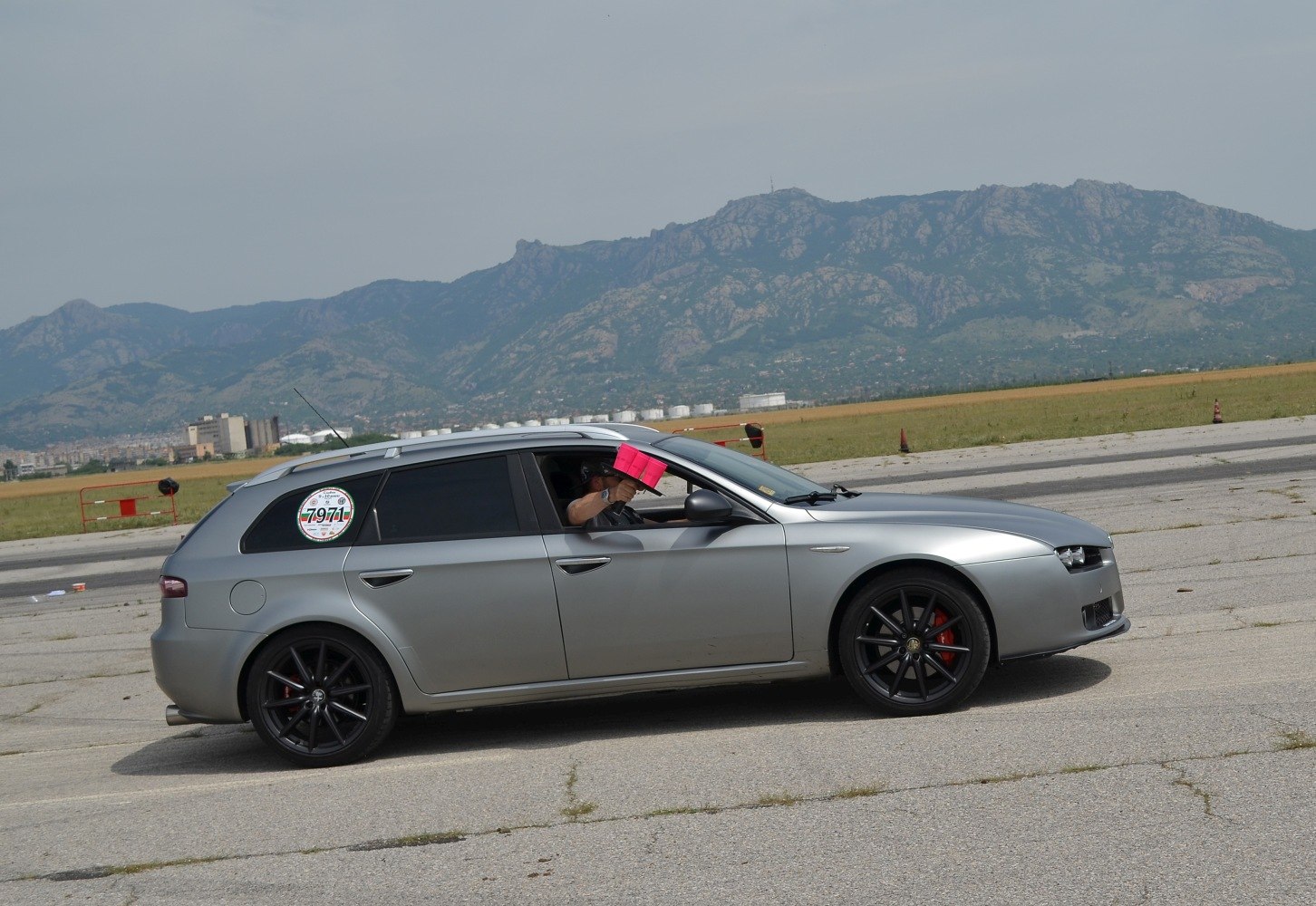 Silver wagon with black alloy wheels and red brake calipers