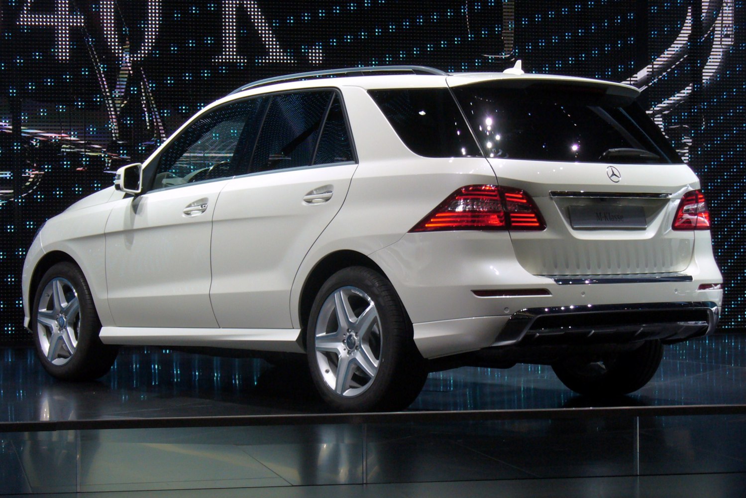 SUV rear profile with LED tail lights and silver alloy wheels