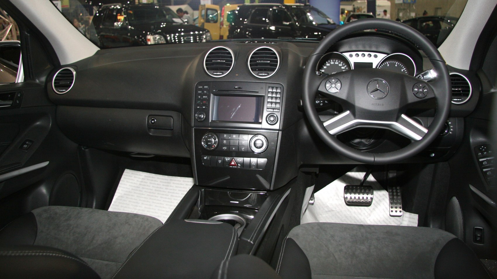Interior dashboard and steering wheel of a luxury SUV