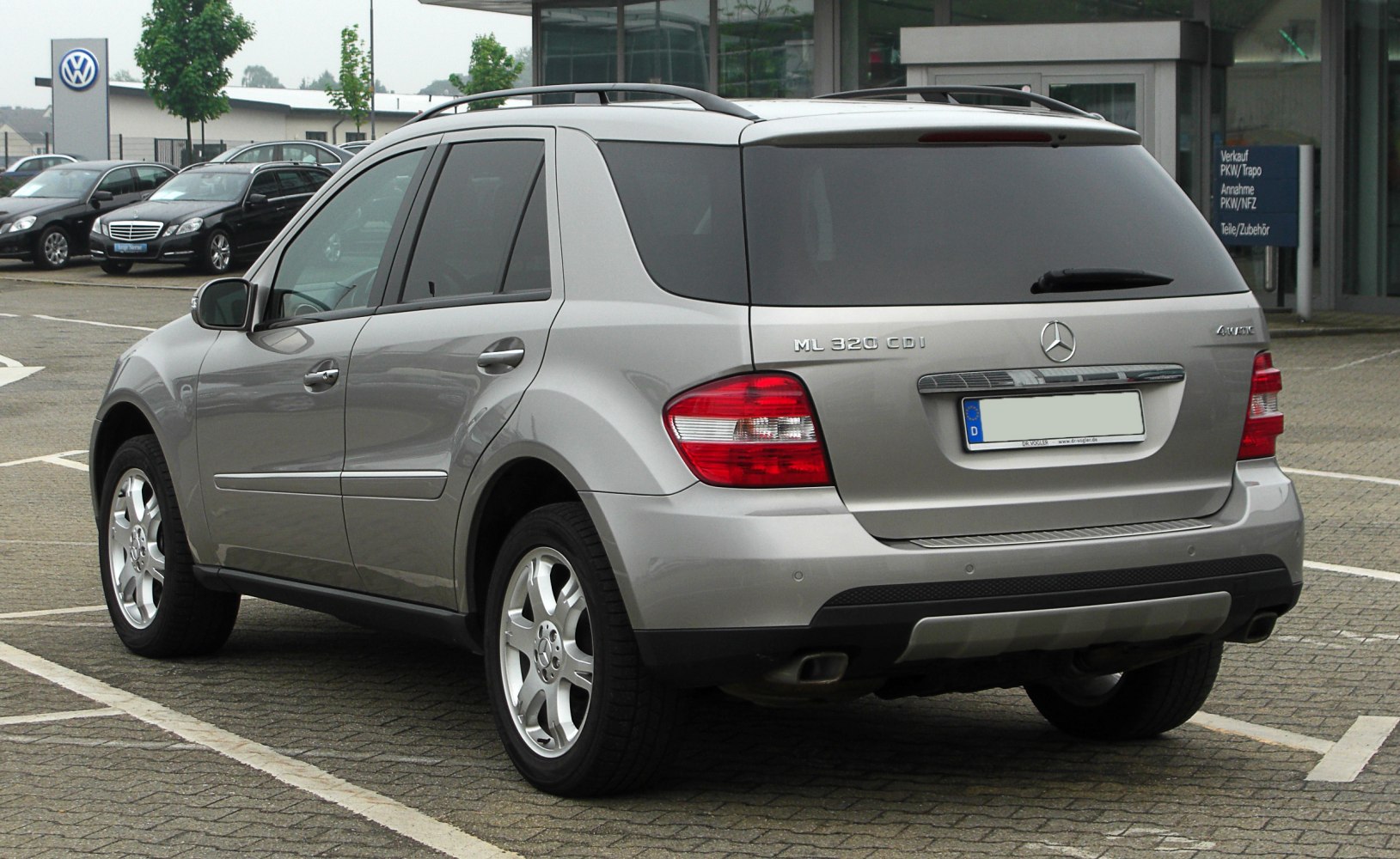 Rear view of SUV with taillights and alloy wheels
