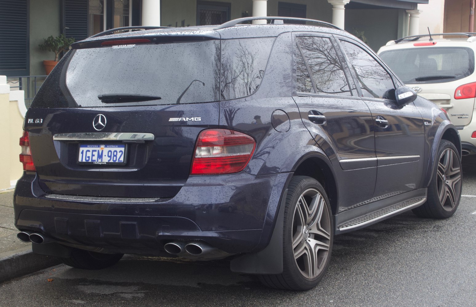 Rear view with quad exhaust tips and AMG alloy wheels