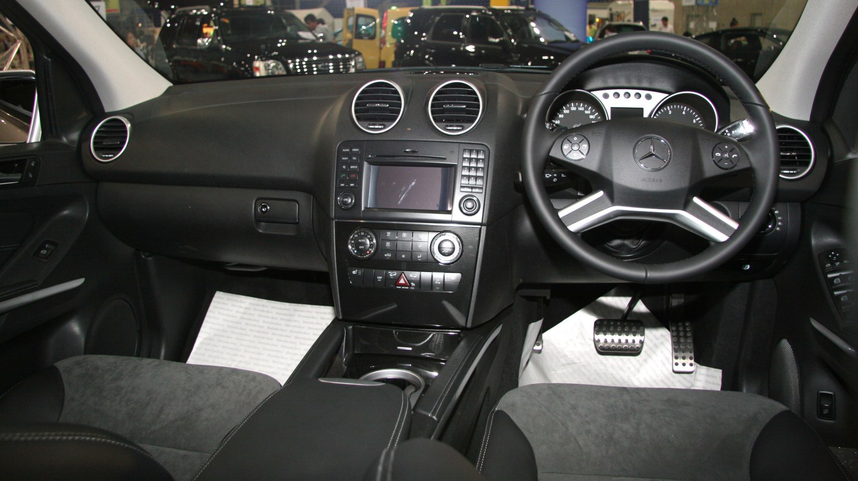 Dashboard, steering wheel, center console, pedals