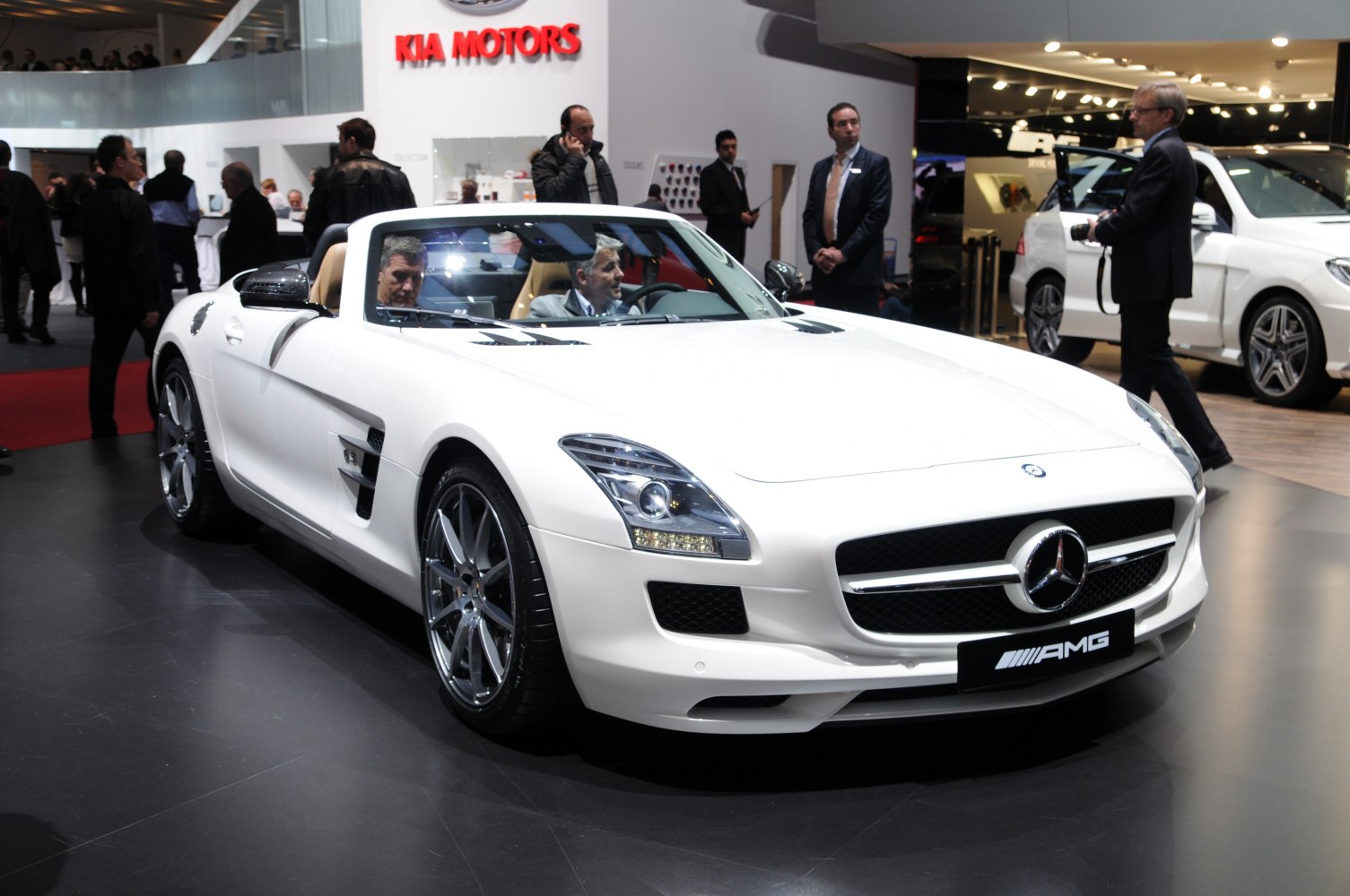 White convertible with sporty front design and alloy wheels