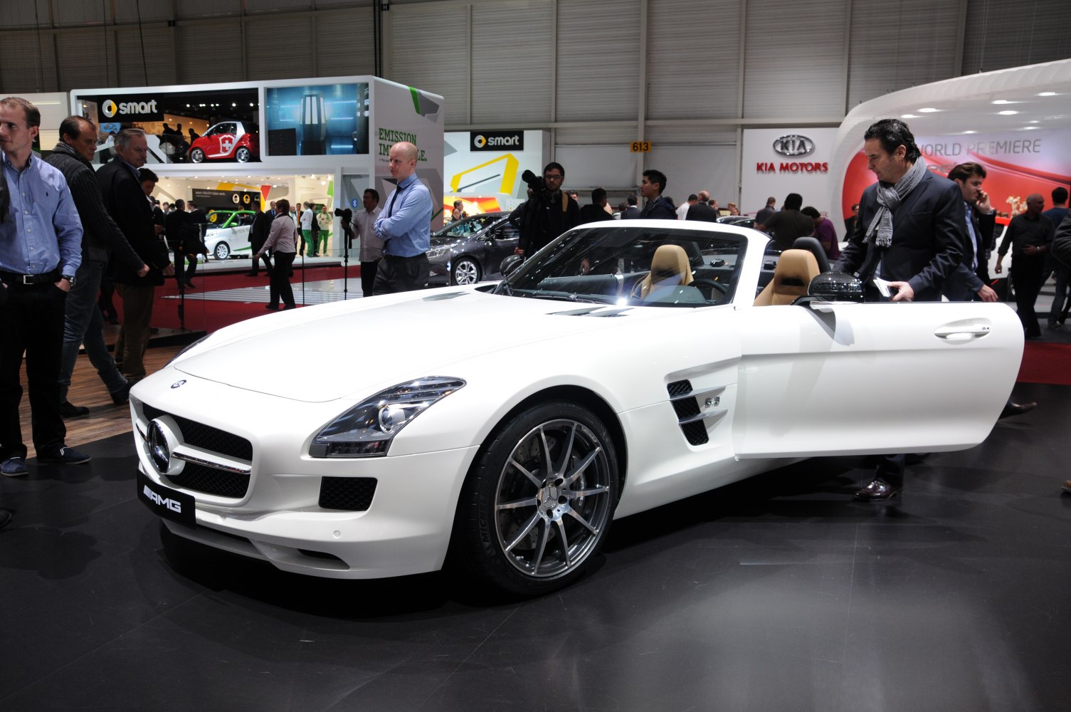 White convertible with open front door and sporty front design