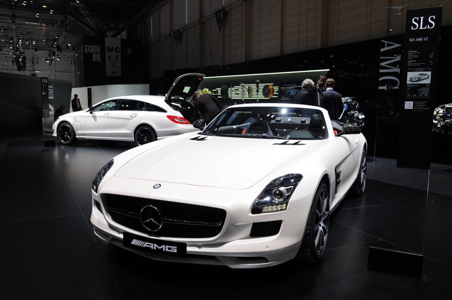 White luxury convertible with AMG badge and sport design