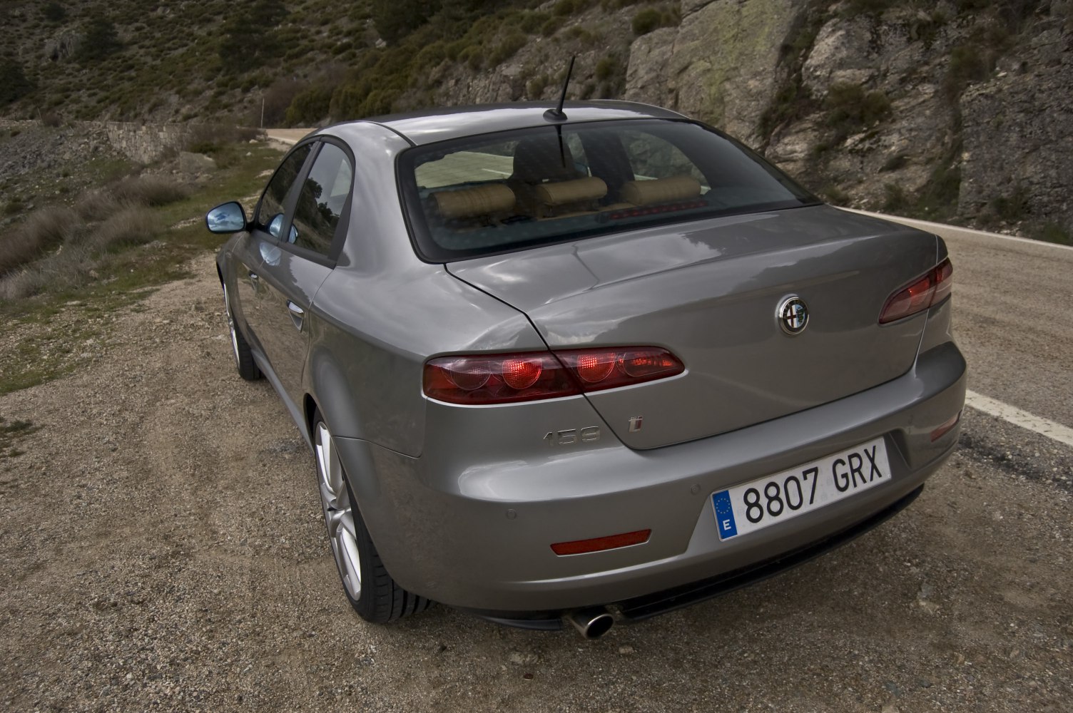 Sleek rear design with distinct tail lights and smooth lines.