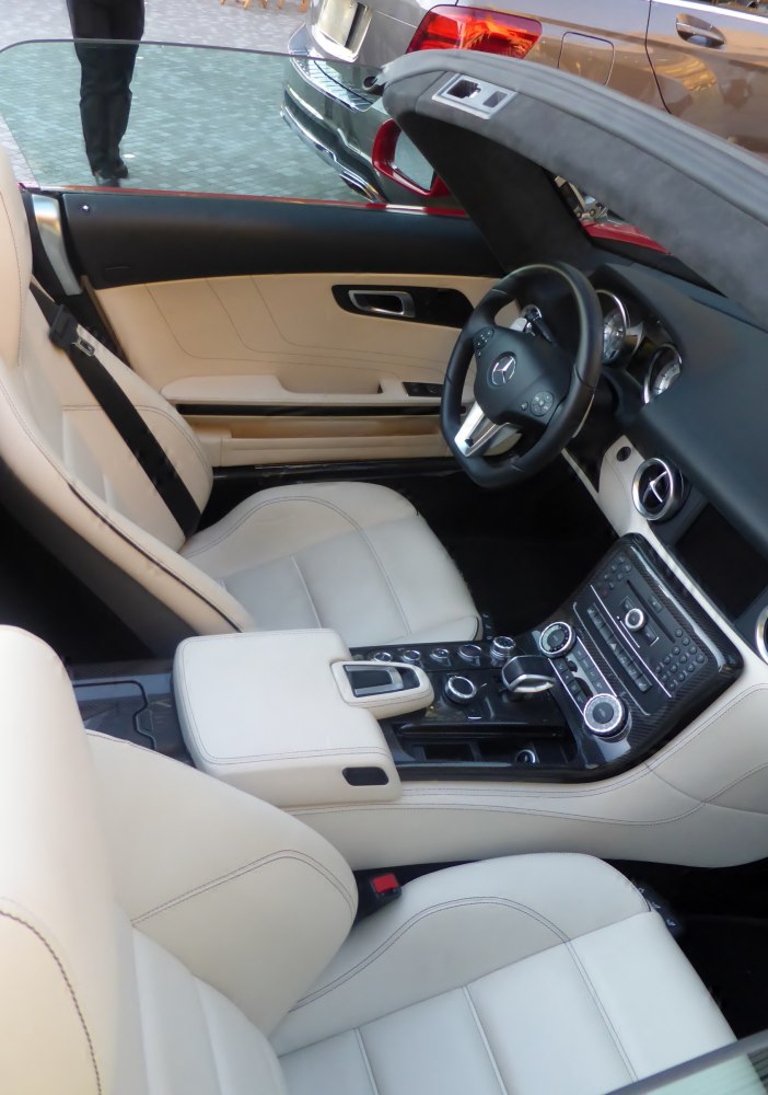 Beige leather interior with modern dashboard and center console details