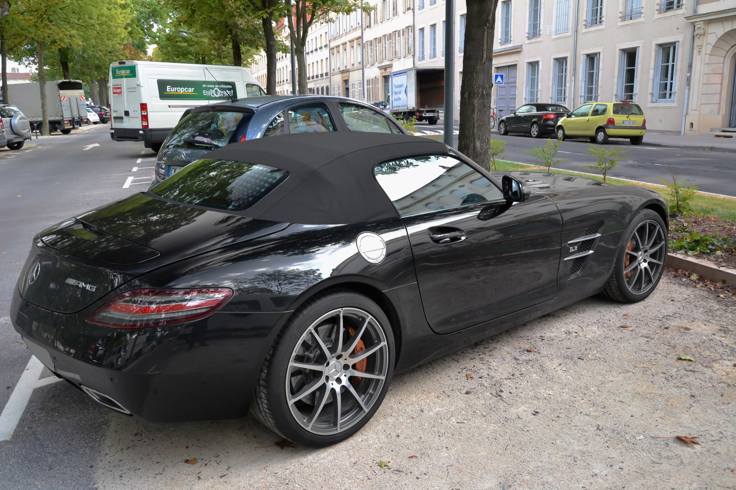 Convertible with soft top roof and multi-spoke AMG wheels
