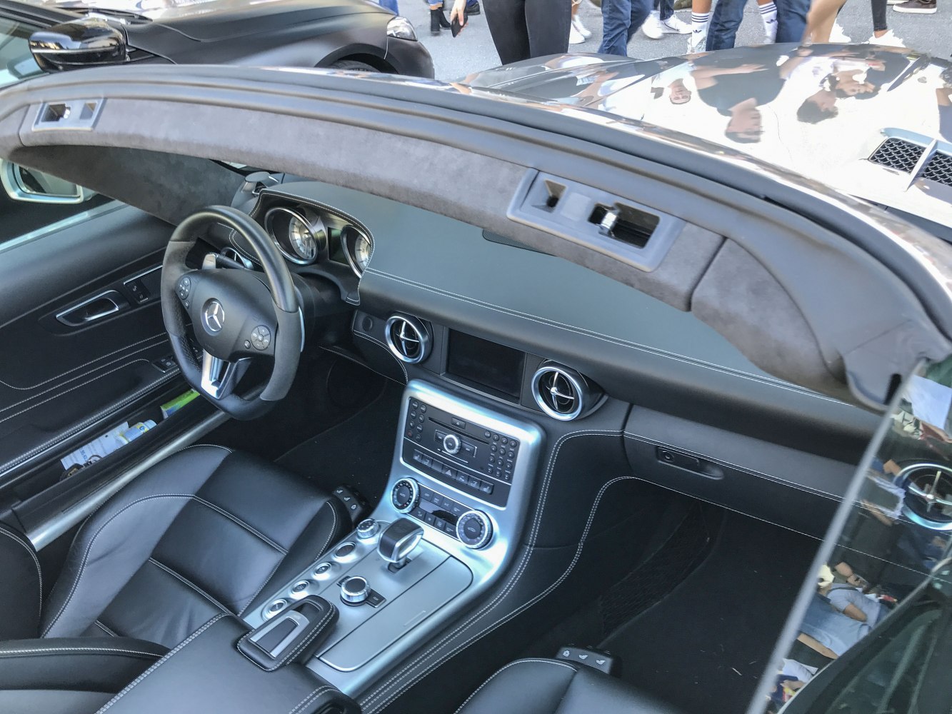 Luxury roadster interior with steering wheel and modern dashboard