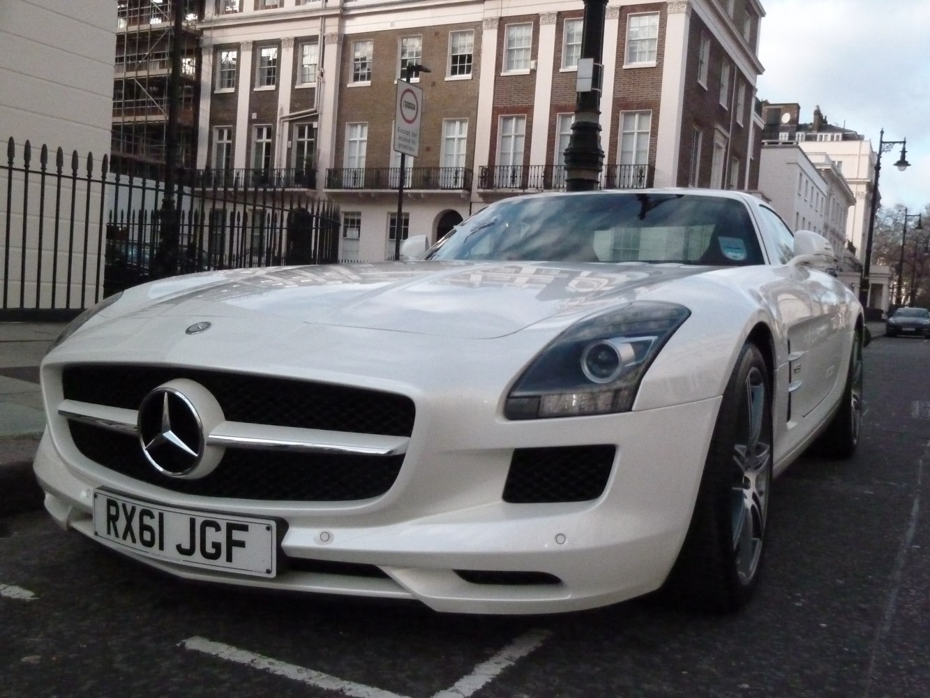 Close-up of front grille and headlight of a luxury sports coupe