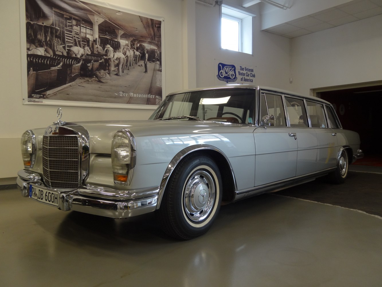 Classic vintage limousine with chrome grille and extended body